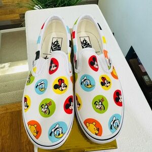 Vans women’s White Slip-On Sneakers with Multicolor Disney Character Circles